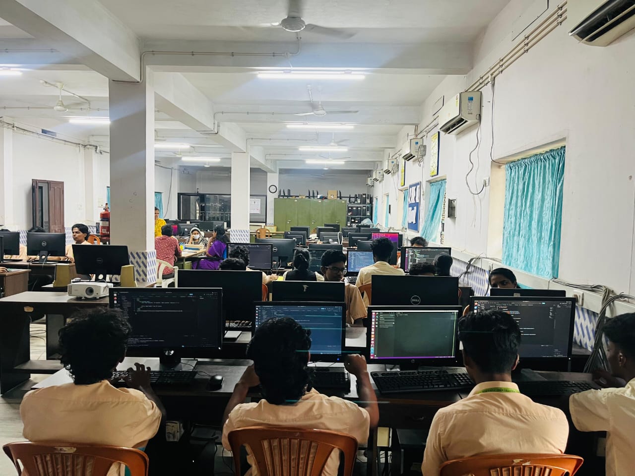 ForzaSoft Solutions interns practicing coding in a computer lab